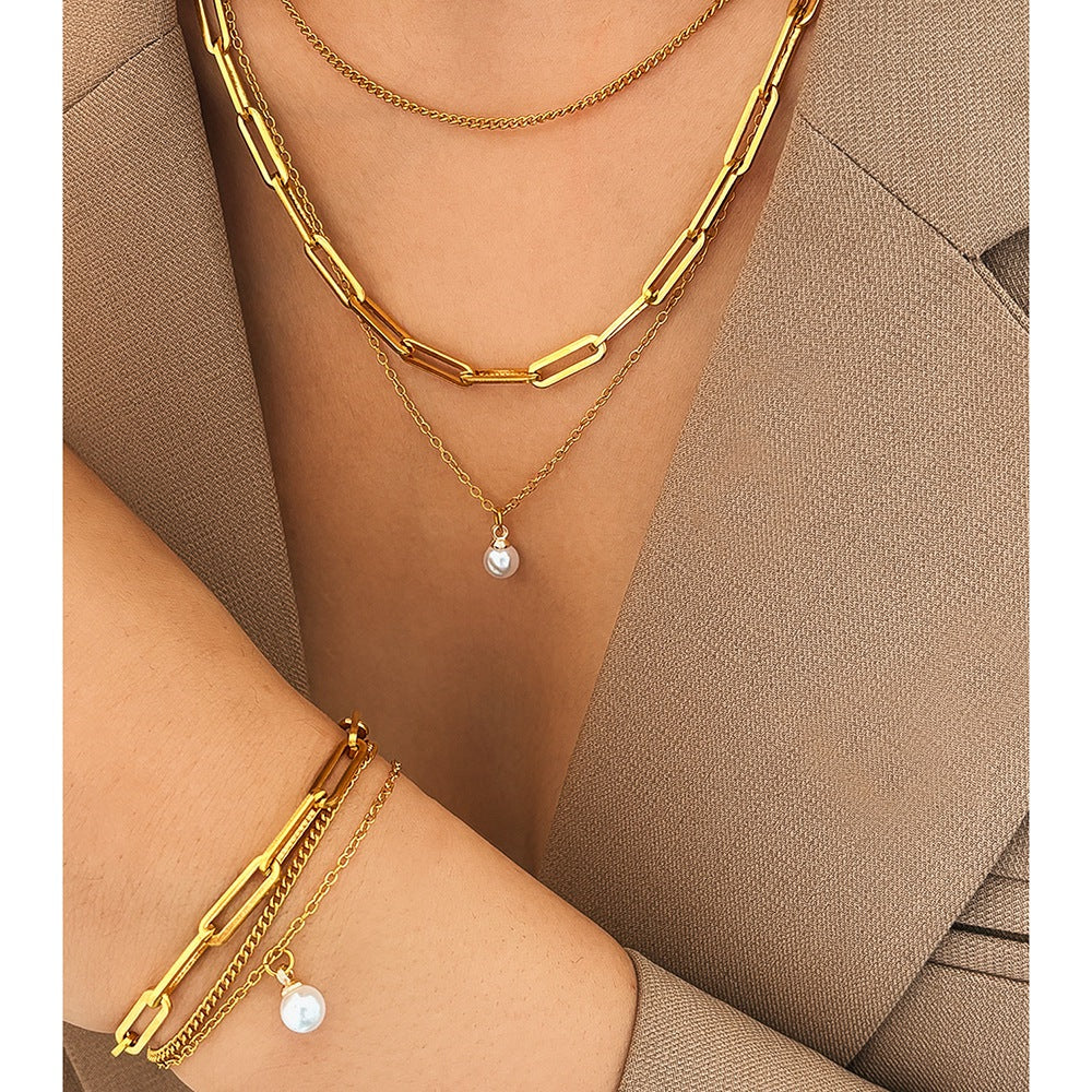 Conjunto de collar y pulsera de eslabone y perla