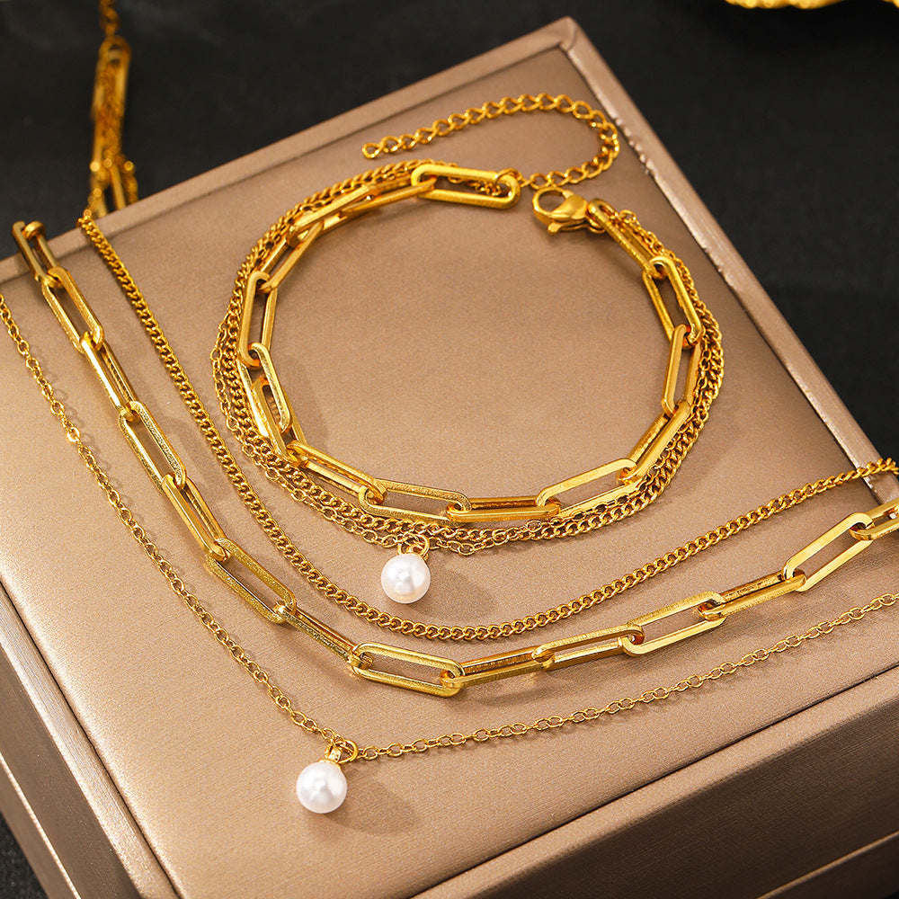 Conjunto de collar y pulsera de eslabone y perla