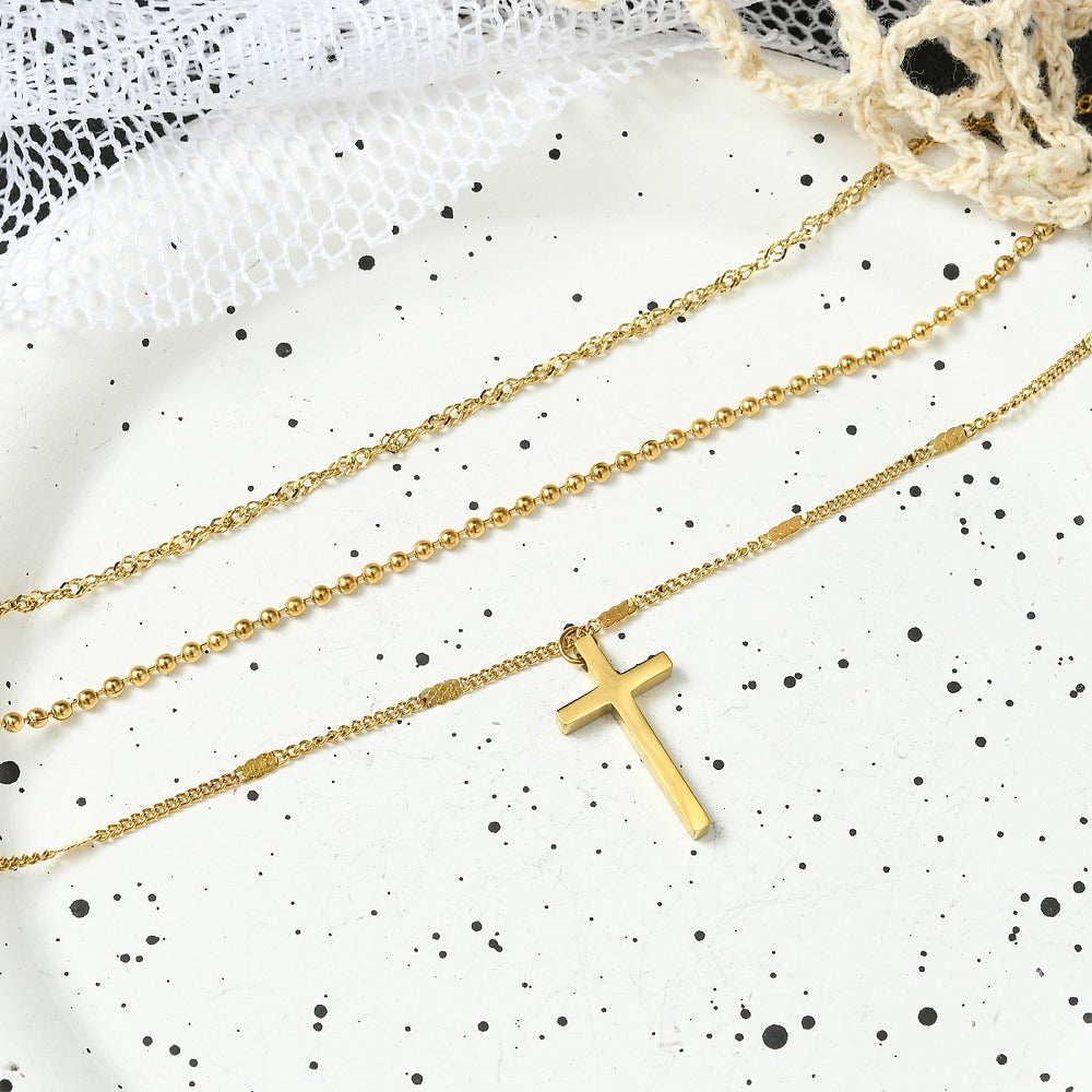 Collar de capas con cruz