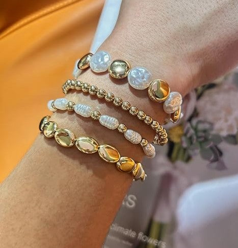 Conjunto de pulseras con perlas