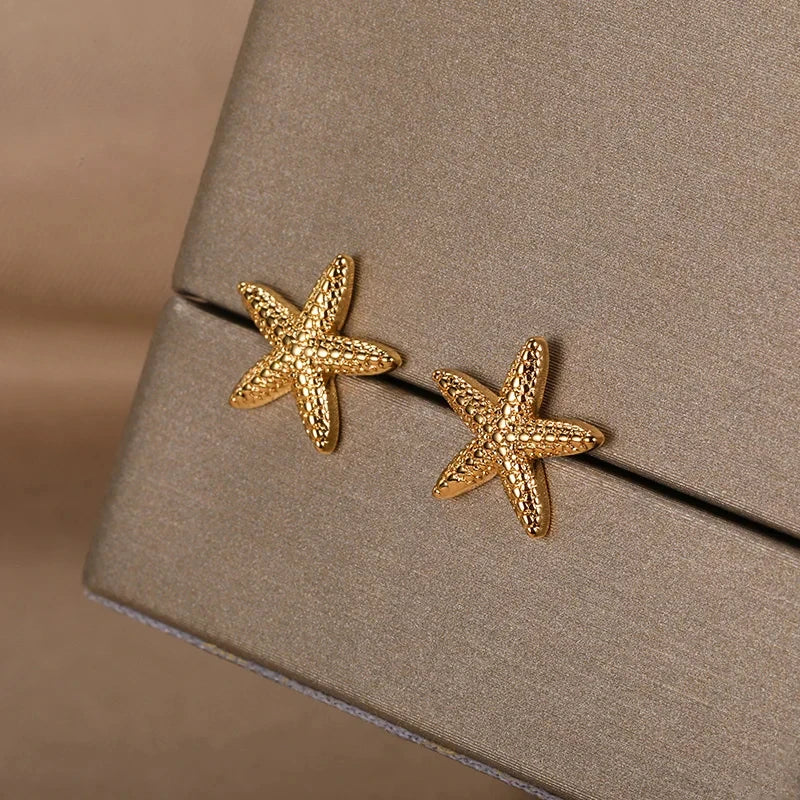 Pendientes de estrella de mar dorado