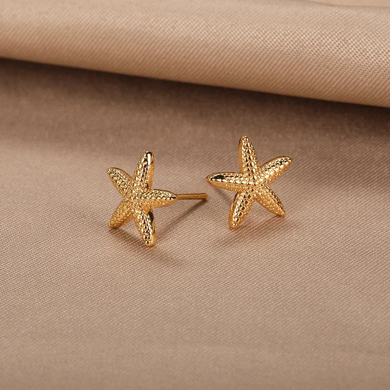 Pendientes de estrella de mar dorado