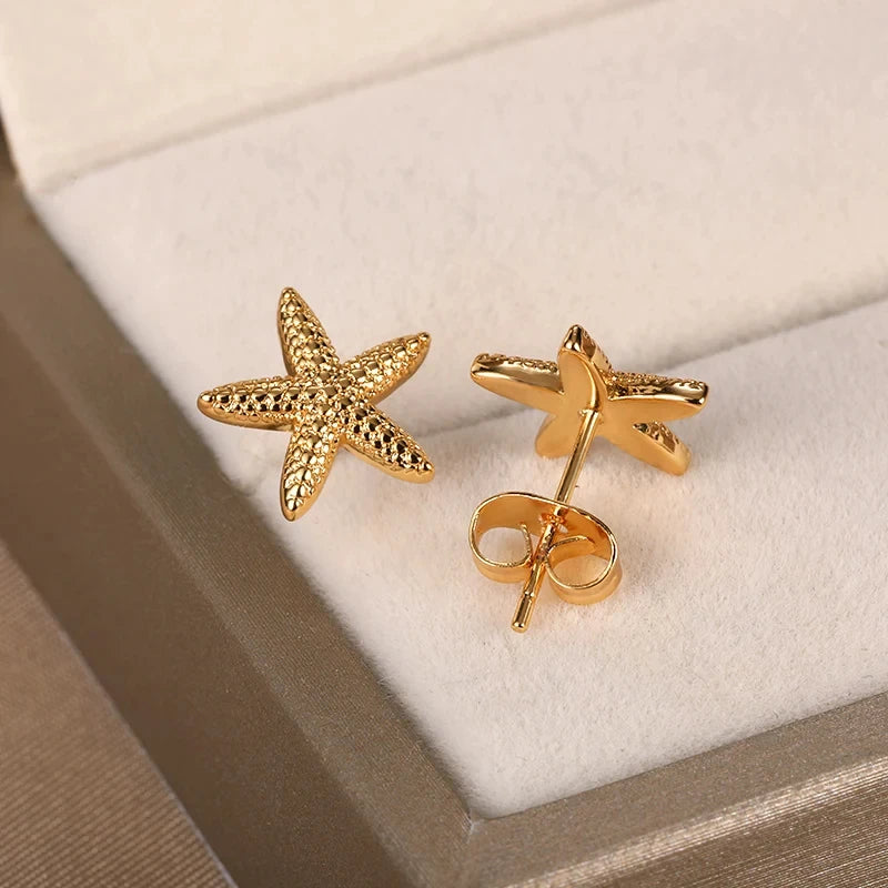 Pendientes de estrella de mar dorado