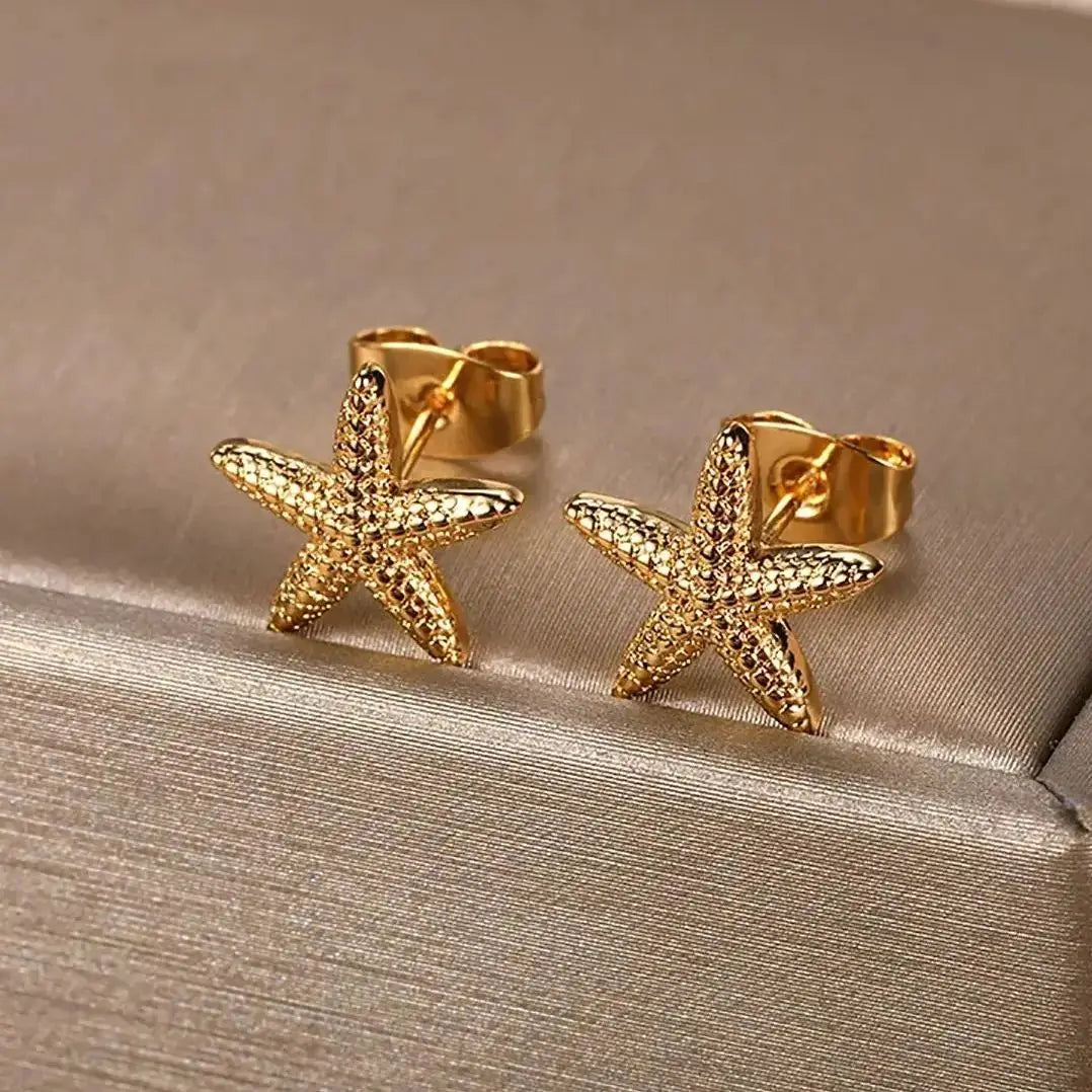 Pendientes de estrella de mar dorado